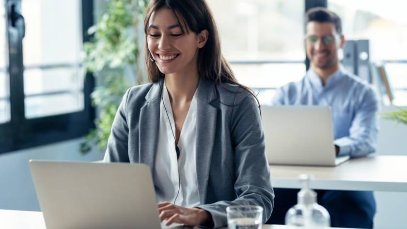 business team working while doing a video call on online briefing with laptop