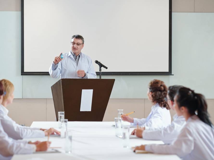 Researcher speaking at conference