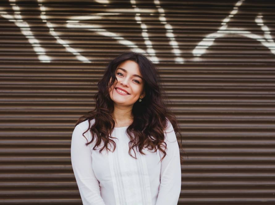 Pretty plus size woman smiling with perfect smile